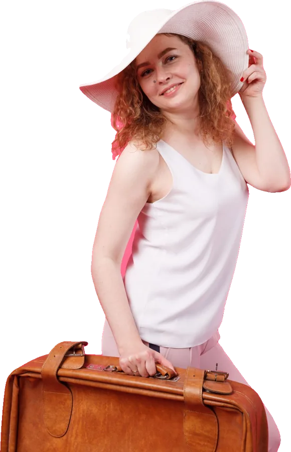 A traveller with a sun hat and a leather suitcase