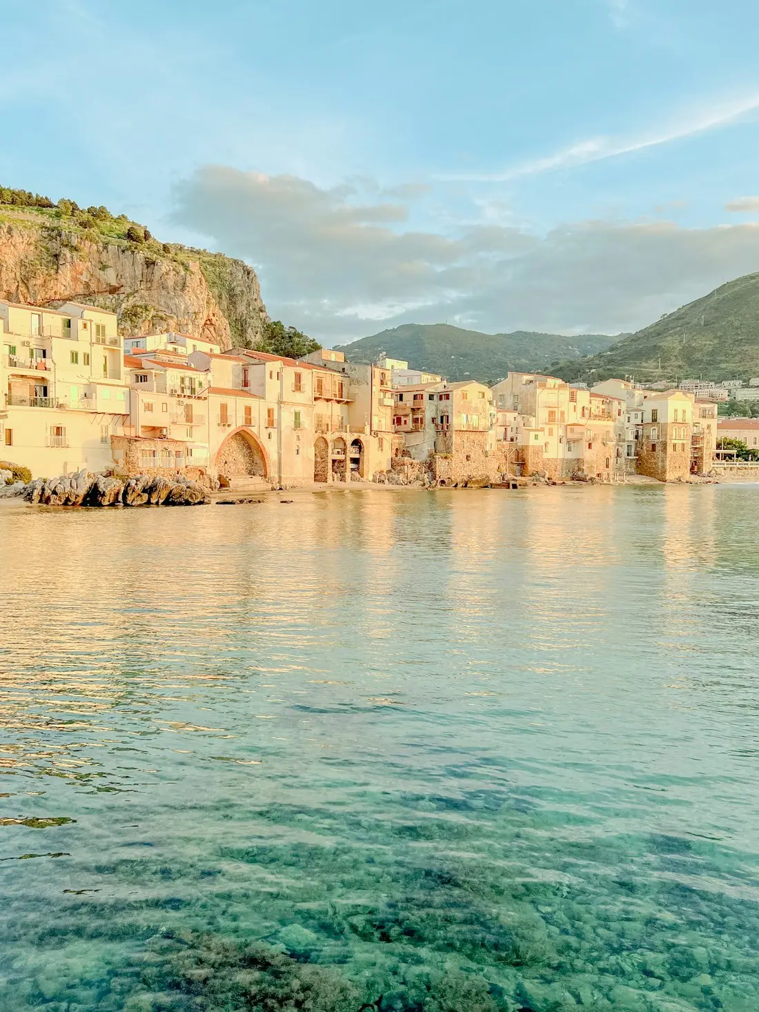 An old town by the sea in Sicily in the evening light
